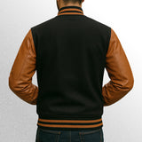 Black jacket with brown leather sleeves back view