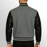 Gray varsity jacket with black leather sleeves back image