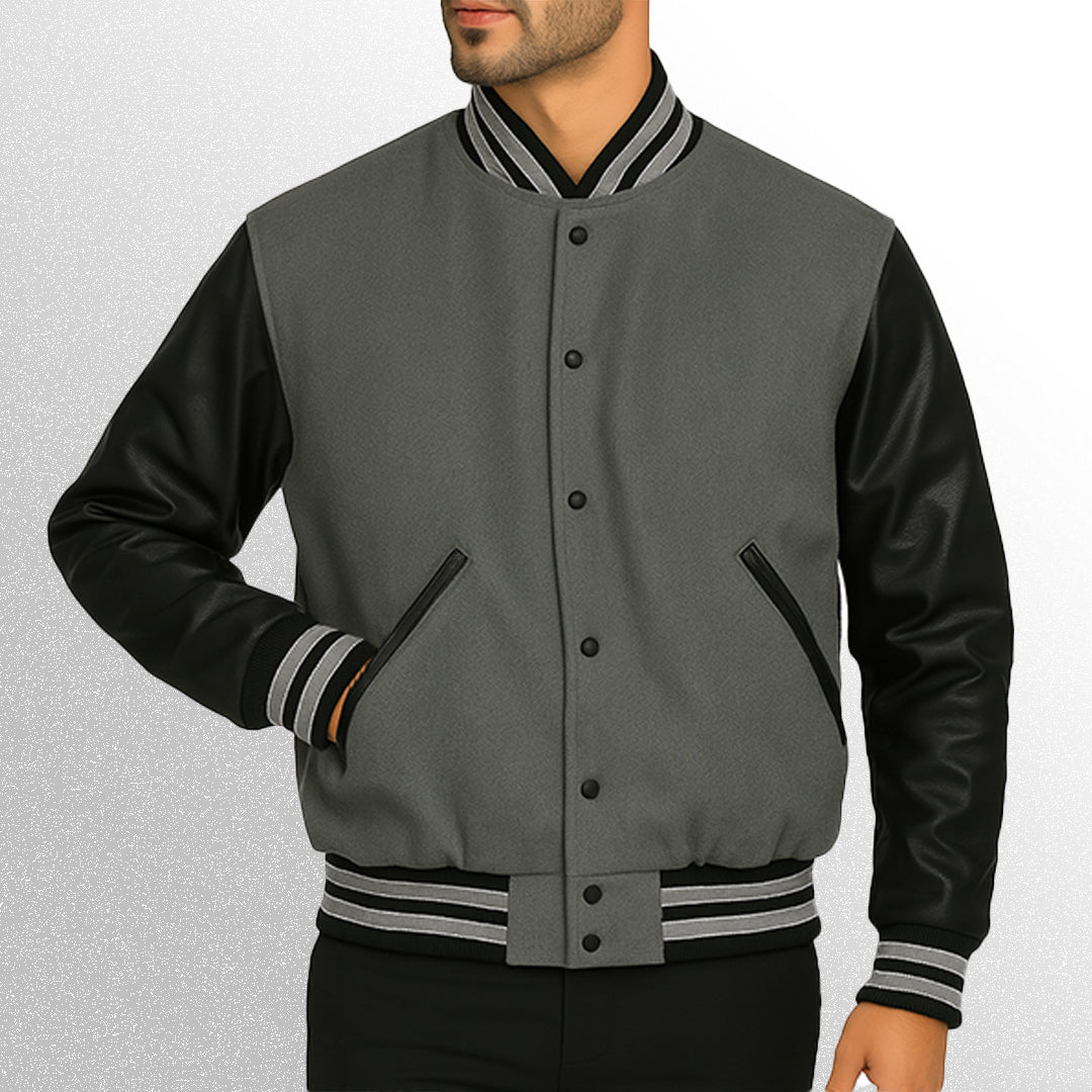Gray varsity jacket with black leather sleeves